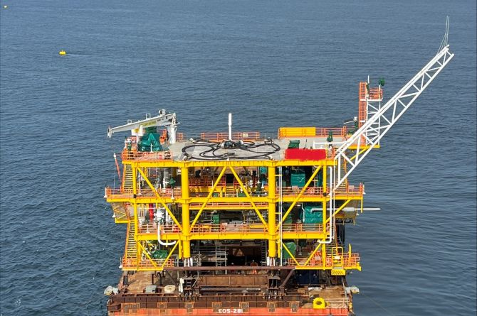 Positioning one of the topsides.